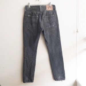 Distressed black Levi jeans 512